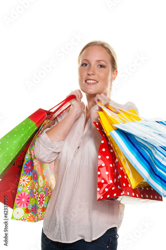 Photo: Frau mit Einkaufstaschen beim Shopping Frau mit Einkaufstaschen beim Shopping