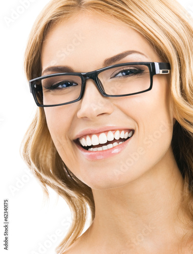 Photo: Cheerful smiling woman in glasses, isolated Cheerful smiling woman in glasses, isolated