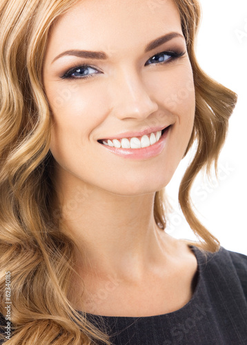 Photo: Happy smiling young woman, over white Happy smiling young woman, over white