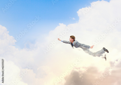 Photo: Flying businessman Flying businessman