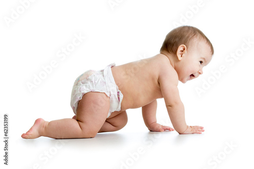 Photo: pretty crawling baby girl isolated on white background pretty crawling baby girl isolated on white background