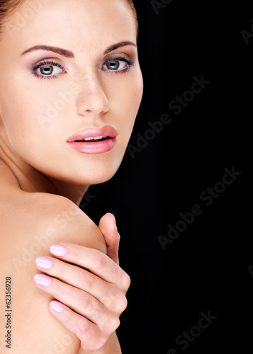 Photo: Beautiful face of the adult woman with fresh skin Beautiful face of the adult woman with fresh skin