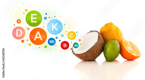 Photo: Healthy fruits with colorful vitamin symbols and icons Healthy fruits with colorful vitamin symbols and icons
