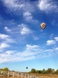Beautiful hot air balloons in the sky over the countryside. Beautiful hot air balloons in the sky over the countryside.