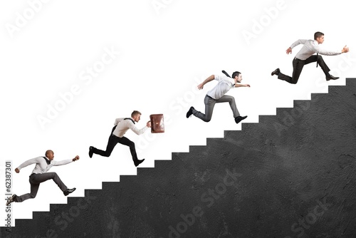 Photo: Businesspeople climbing stairs Businesspeople climbing stairs