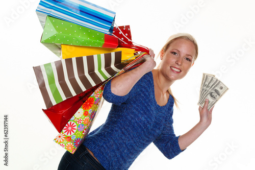 Photo: Frau mit Einkaufstaschen beim Shopping Frau mit Einkaufstaschen beim Shopping