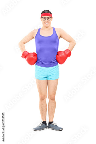Photo: Young athlete posing with boxing gloves Young athlete posing with boxing gloves