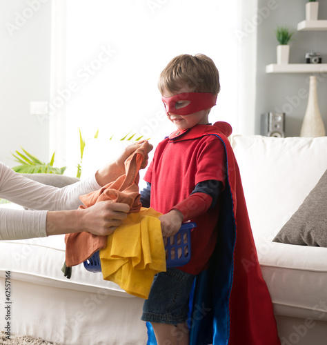 Photo: Superhero helping out with laundry Superhero helping out with laundry
