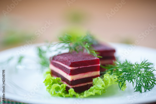 Photo: appetizer of beet and cheese on lettuce leaves appetizer of beet and cheese on lettuce leaves