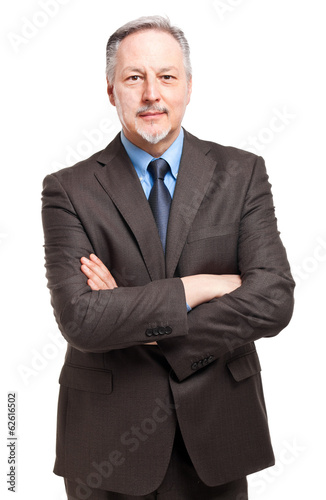 Photo: Smiling businessman isolated on white Smiling businessman isolated on white