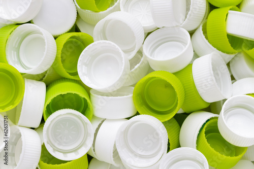 Photo: White & green plastic bottole caps White & green plastic bottole caps