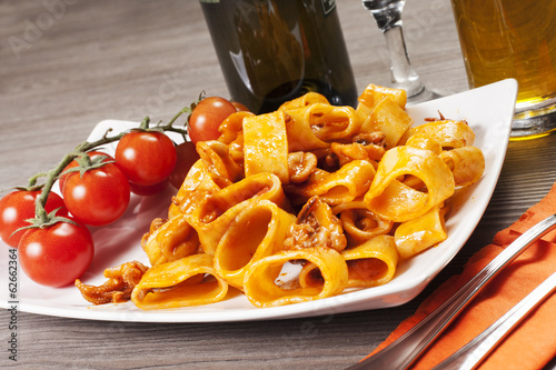 Photo: Pasta al sugo con calamari Pasta al sugo con calamari