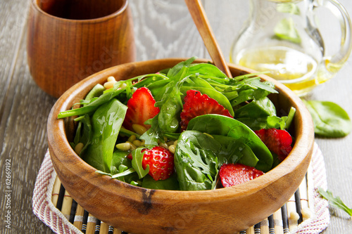 Photo: Light salad with spinach and strawberries. Light salad with spinach and strawberries.