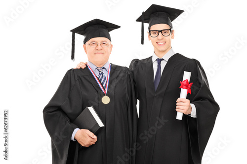 Photo: Young graduate student posing with the dean Young graduate student posing with the dean