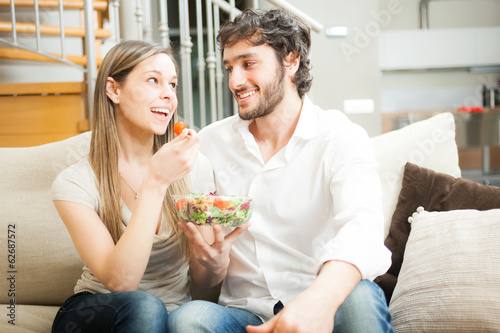 Photo: Couple eating a salad Couple eating a salad