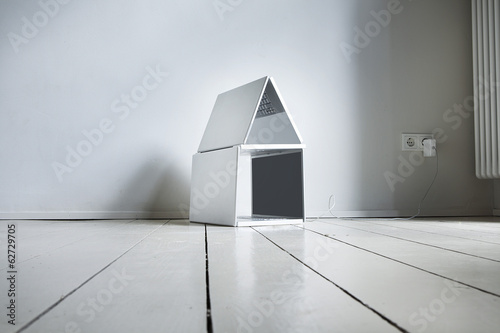 Photo: Laptop -Haus auf Holzboden Laptop -Haus auf Holzboden