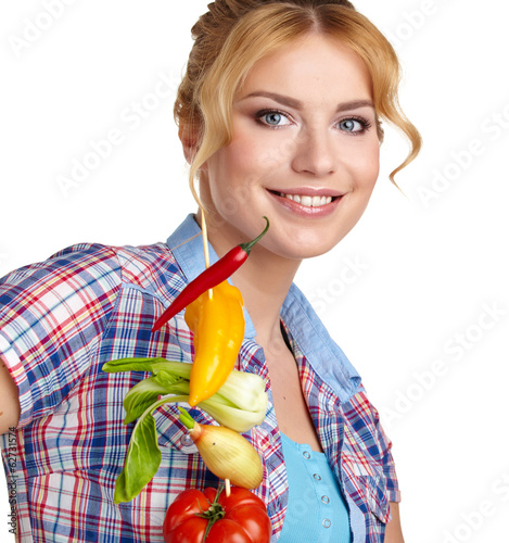Photo: isolated Woman holding vegetable skewers isolated Woman holding vegetable skewers