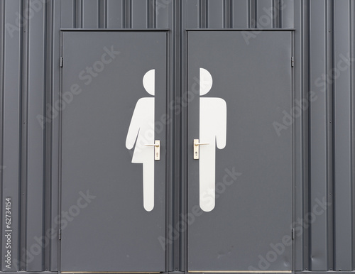 Photo: Deutschland, Männliche und weibliche Zeichen auf Toilettentür Deutschland, Männliche und weibliche Zeichen auf Toilettentür