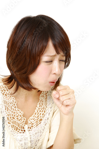 Photo: 咳をする女性 咳をする女性