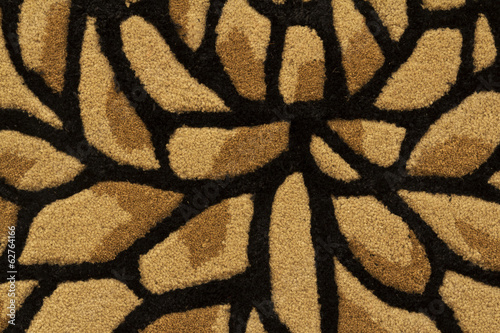 Photo: Carpet with floral design texture close up Carpet with floral design texture close up