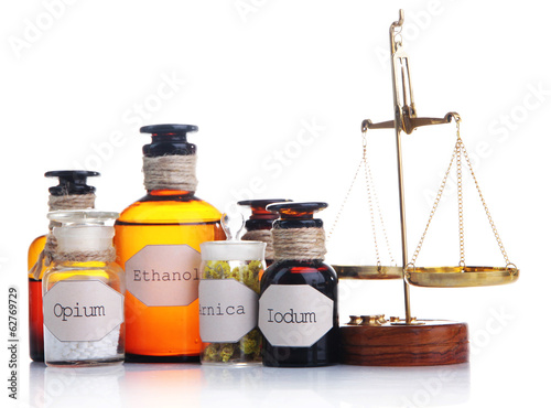 Photo: Historic old pharmacy bottles with label and Old-fashioned Historic old pharmacy bottles with label and Old-fashioned