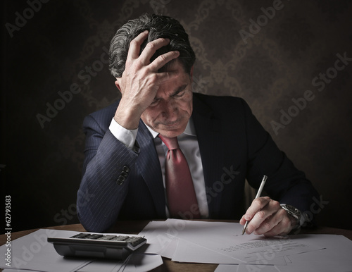Photo: writing businessman writing businessman