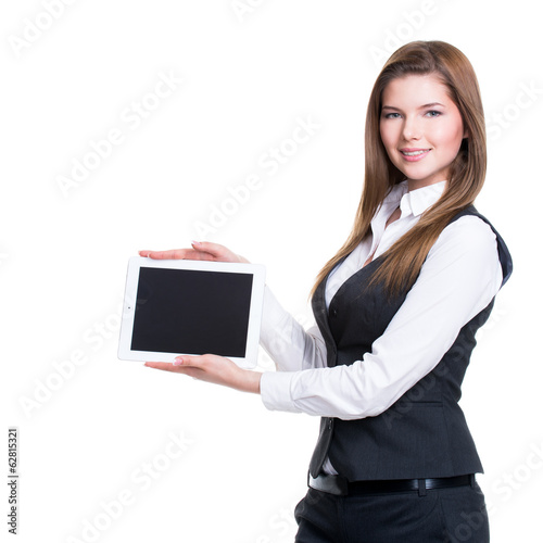 Photo: Young smiling business woman holding tablet. Young smiling business woman holding tablet.