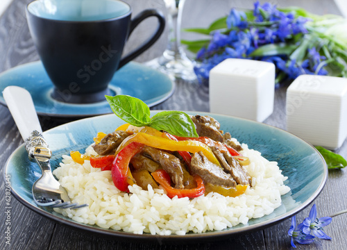 Photo: Beef with peppers and rice the Asian way. Beef with peppers and rice the Asian way.