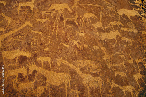 Photo: Rock art engravings at Twyfelfontein World Heritage Site at Uibasen Conservancy, Damaraland, Namibia Rock art engravings at Twyfelfontein World Heritage Site at Uibasen Conservancy, Damaraland, Namibia
