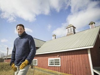 Photo: An Organic Farm in Winter in Cold Spring, New York State. A man working outdoors on the farm. An Organic Farm in Winter in Cold Spring, New York State. A man working outdoors on the farm.