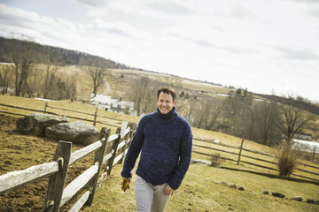 Photo: An Organic Farm in Winter in Cold Spring, New York State. A man working outdoors on the farm. An Organic Farm in Winter in Cold Spring, New York State. A man working outdoors on the farm.