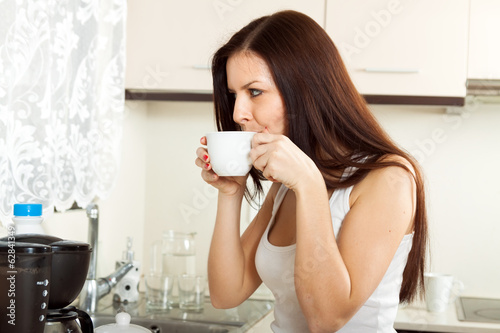 Photo: girl drinking coffee. girl drinking coffee.