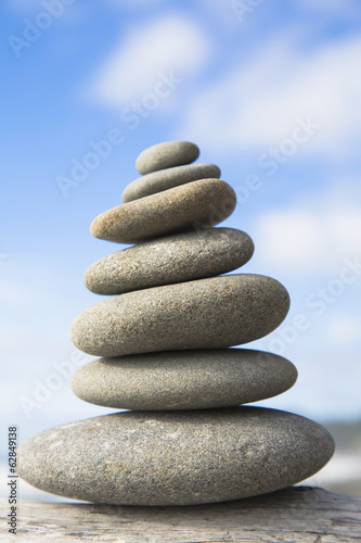 Photo: A pile of balancing smooth beach rocks near Rialto Beach, Olympic national park, in Washington, USA A pile of balancing smooth beach rocks near Rialto Beach, Olympic national park, in Washington, USA