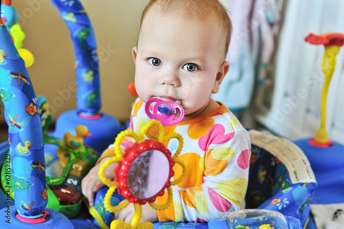 Photo: funny baby with dummy funny baby with dummy