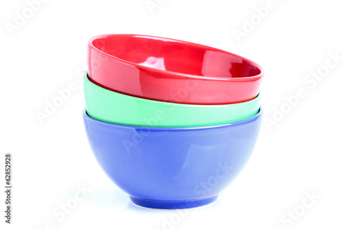 Photo: Three colored bowls. Three colored bowls.