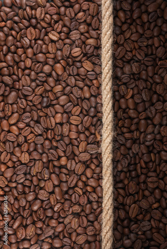 Photo: Illuminated and dark coffee beans and rope Illuminated and dark coffee beans and rope