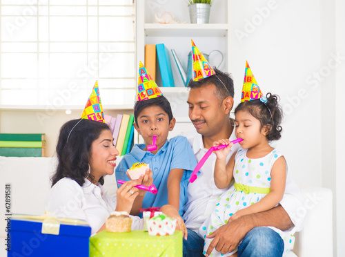 Photo: indian family birthday celebration with son and daughter indian family birthday celebration with son and daughter
