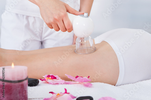 Photo: Woman Getting Laser Therapy Woman Getting Laser Therapy