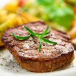 Grilled steak, baked potatoes and vegetables Grilled steak, baked potatoes and vegetables
