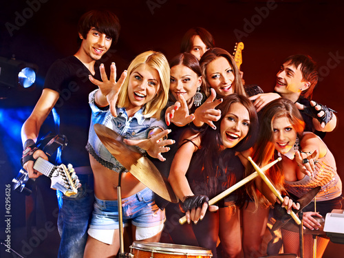Photo: Band playing musical instrument. Band playing musical instrument.