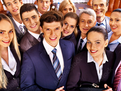 Photo: Group business people in office. Group business people in office.