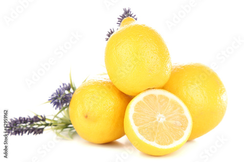 Photo: Still life with fresh lemons and lavender, isolated on white Still life with fresh lemons and lavender, isolated on white