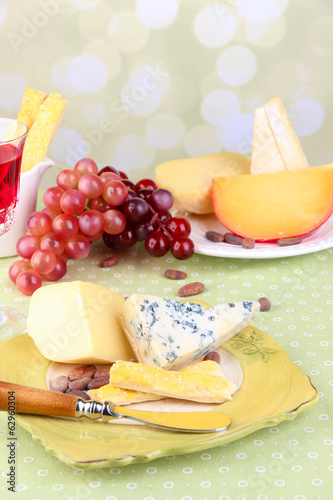 Photo: Assorted cheese plate , grape, bread sticks. Assorted cheese plate , grape, bread sticks.