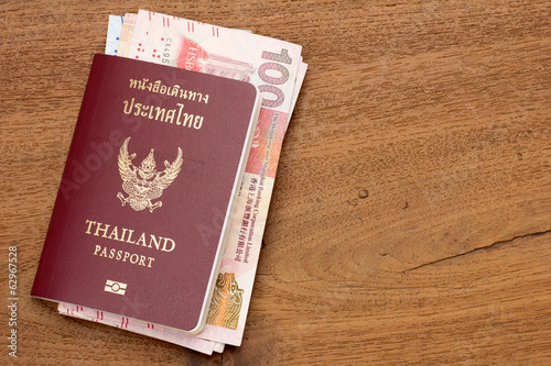 Photo: Thailand passport with hongkong currency. Thailand passport with hongkong currency.