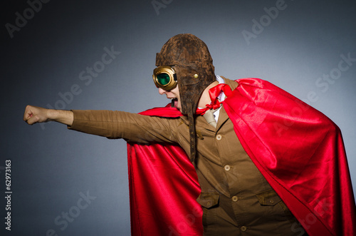 Photo: Funny pilot with goggles and helmet Funny pilot with goggles and helmet
