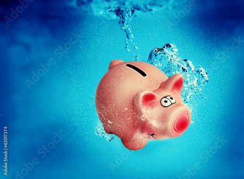 Photo: sinking piggy bank sinking piggy bank