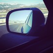 free highway/motorway in a mirror of blue modern car free highway/motorway in a mirror of blue modern car