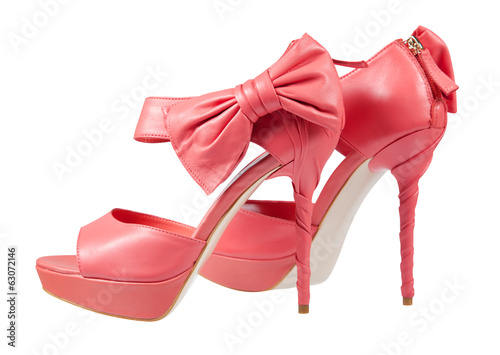 Photo: Pink shoes with a bow on a high heel Pink shoes with a bow on a high heel