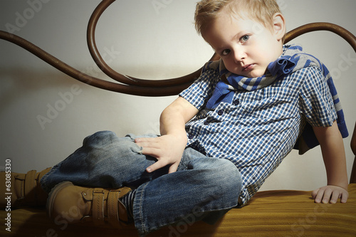 Photo: Child. Handsome little boy.Fashion Children.Emotion Child. Handsome little boy.Fashion Children.Emotion