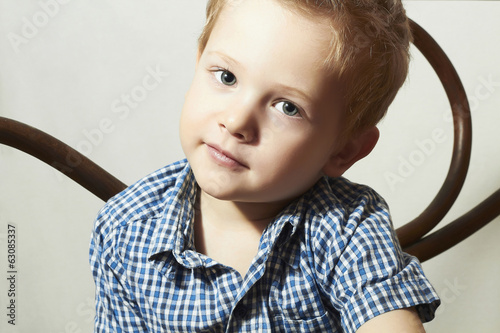 Photo: Child. Handsome little boy.Fashion Children.Emotion Child. Handsome little boy.Fashion Children.Emotion